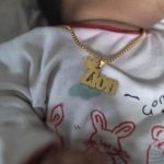 Adorn your baby boy with a dashing necklace that's both adorable and meaningful. Our collection features timeless designs, hypoallergenic materials, and personalized options for a perfect fit.