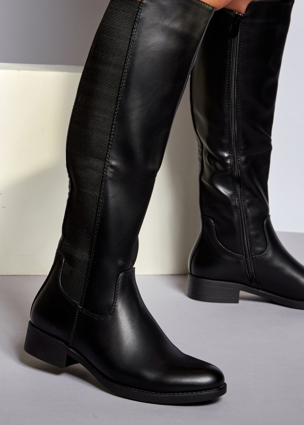 The Allure of Flat Knee High Boots