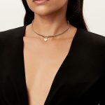 Gilded Elegance: Unveiling the Charms of Gold Bead Necklace