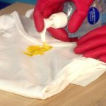 how to remove baby oil from clothes