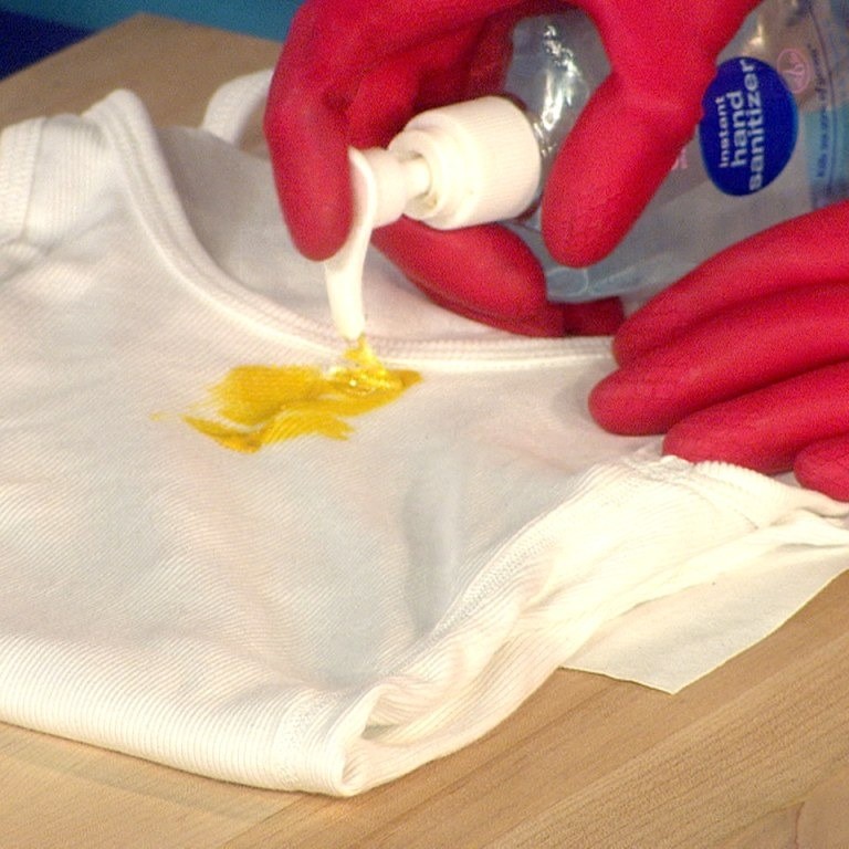 how to remove baby oil from clothes